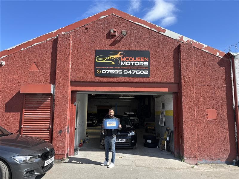 Mechanic working on a car